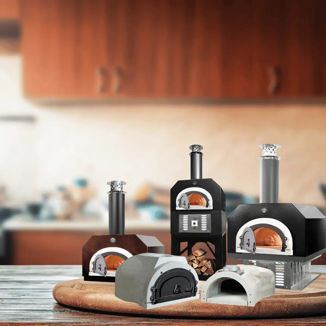Chicago Brick Oven outdoor ovens collection with wood-fired pizza ovens, chimney stacks, and freestanding designs in a warm kitchen setting.
