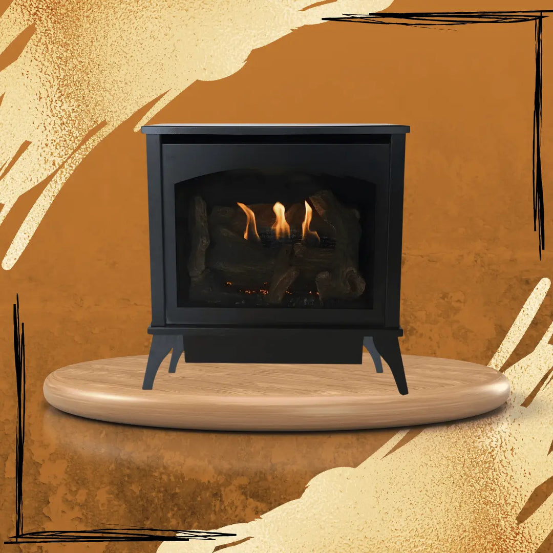 Empire White Mountain Hearth Spirit gas stove with glass front, realistic log set and flames, freestanding black stove on wooden platform with warm textured background.
