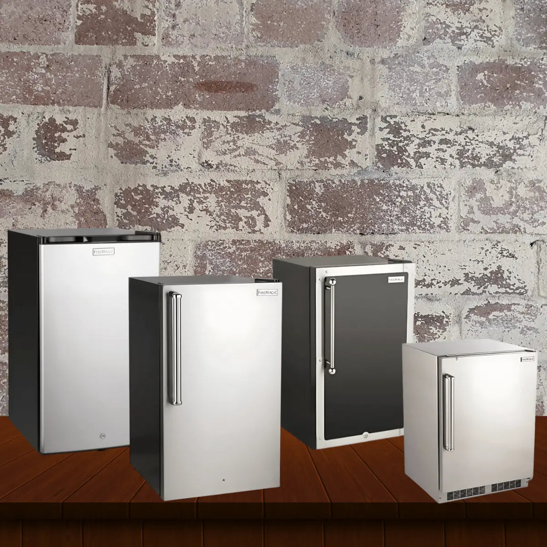 Fire Magic refrigerators collection featuring stainless steel outdoor refrigeration units, including compact and full-size models with sleek handles, displayed on a wooden surface with a rustic brick wall background.