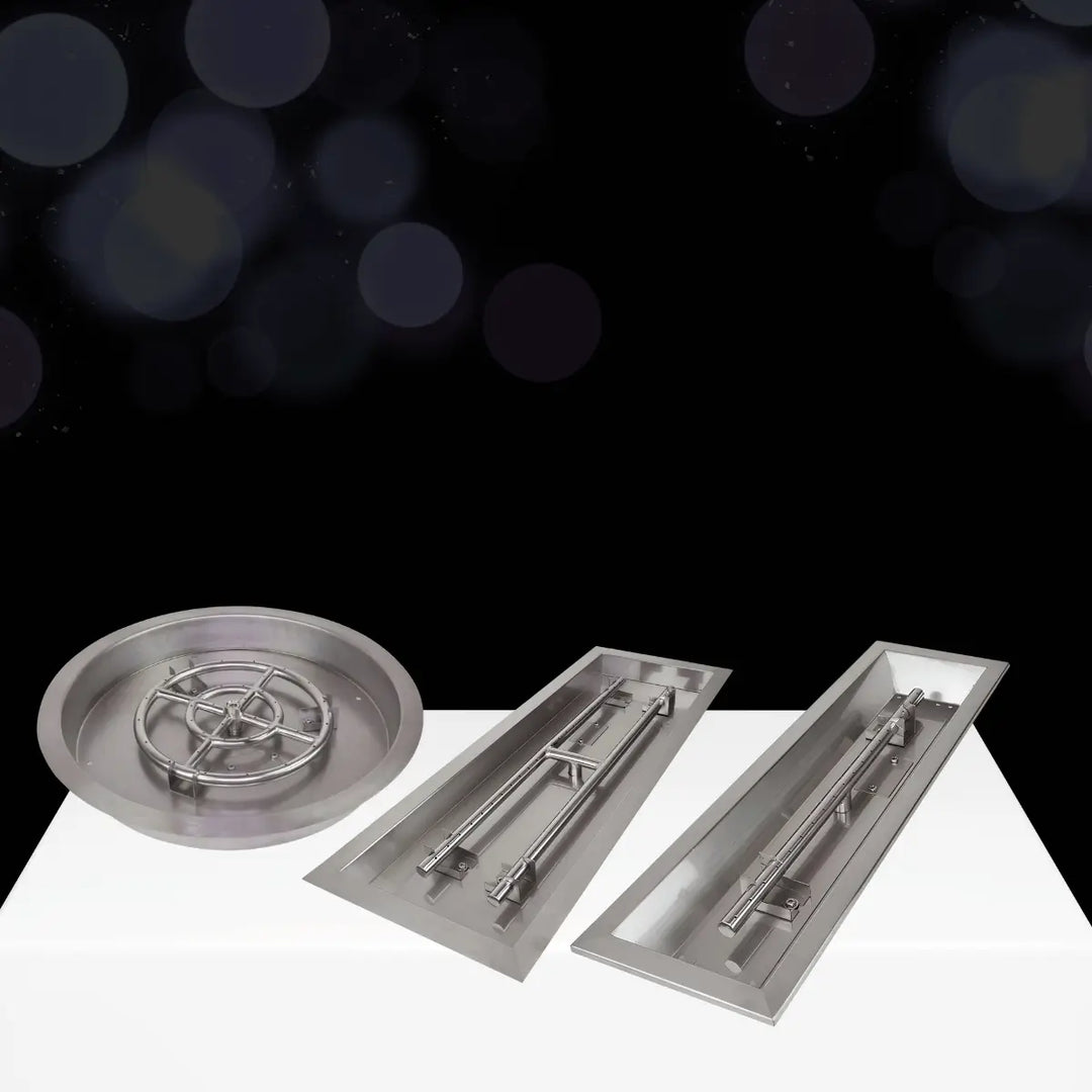 Grand Canyon fire pit burner kits collection with round and linear stainless steel burners for custom outdoor fire pit installations.