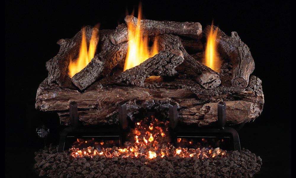 The Charred Aged Split Oak log set, modeled from real wood log samples, is hand painted for that unique, realistic look you are looking for when buying a gas log set. The Charred Aged Split Log Set features the popular burn-through front log look made especially for the G10-24/30 burner. The log set is manufactured to ensure the logs last and retain their strength at high temperatures. At RH Peterson, the attention to detail in the log making and finishing processes guarantees less chipping and breaking for the longest lasting log.
The lively flames and brightly lit ember bed with spillway will add a realistic beauty to your gas fireplace. And, although the front log on the Charred Aged Split log set is not completely split apart, the burn-through look with embers is apparent. The Aged Split front log offers a detailed, charred split log look with some of the smaller logs offering a charred bark appearance. Real-Fyre gas logs are environmentally friendly, drastically reducing pollutants being released into the air. They are the cleanest, most economical and most convenient alternative to burning real wood.
The 24" Charred Aged Split log set consists of 7 pieces, all hand crafted refractory ceramic logs. This 24" log set was specifically designed for the Peterson G10-24/30 burner. The G10 burner is offered with several valve choices including manual, millivolt with on/off remote and standing pilot, millivolt with variable flame remote and standing pilot and variable flame remote with electronic ignition.
